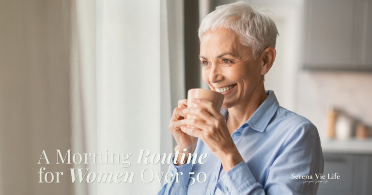morning routine for women over 50 — woman holding coffee cup by window