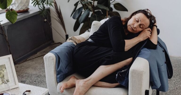 why am I so tired all the time women over 50 — tired woman resting on a chair during the day