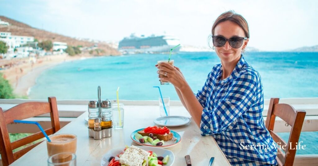 mediterranean lifestyle women over 50 enjoying sunny terrace by the sea