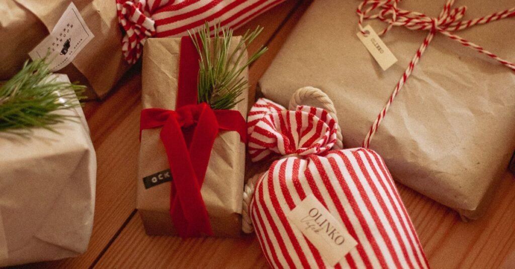 wrapped Christmas gifts for women over 60 under a cozy tree